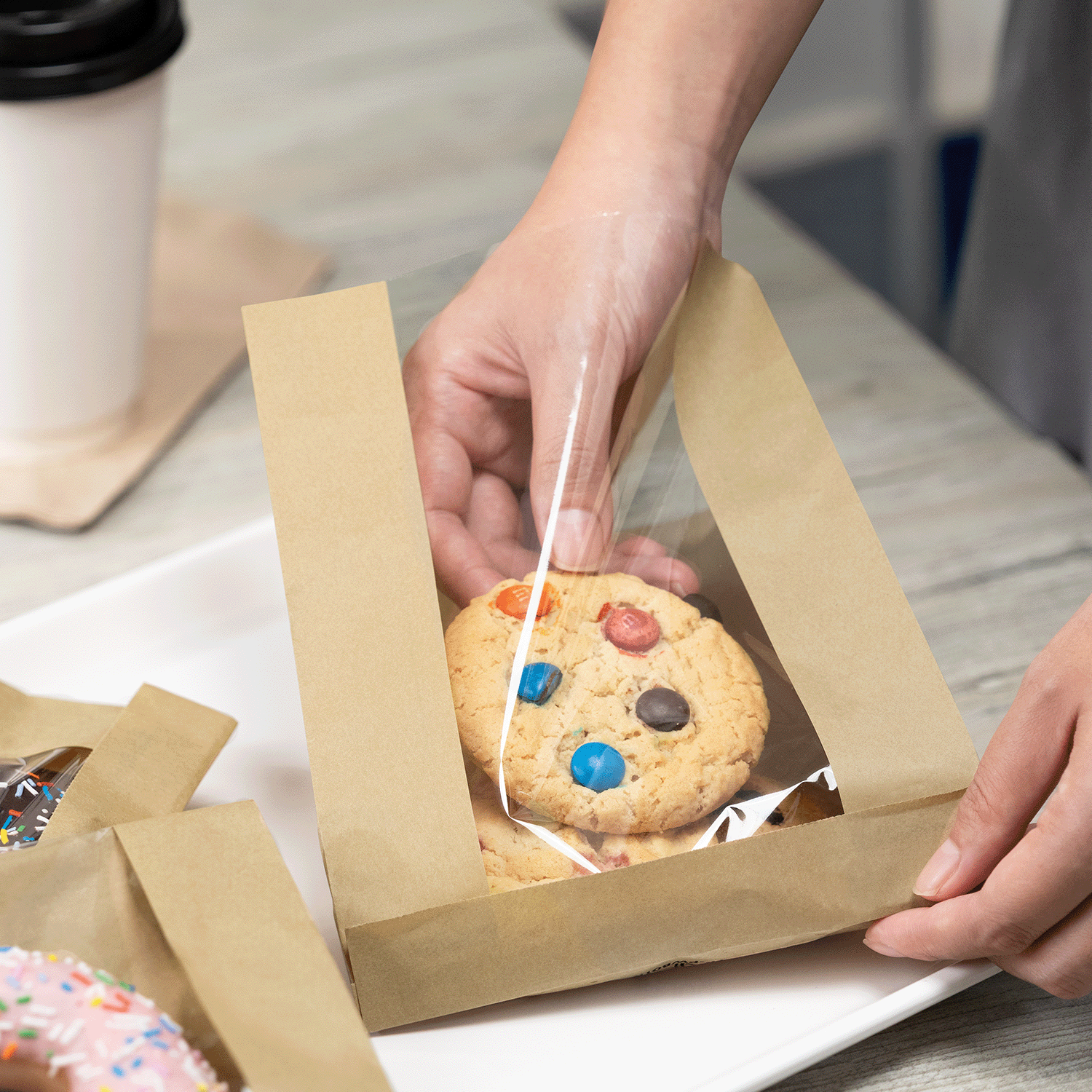 Flat pack kraft paper bakery bag with offset easy open lip
