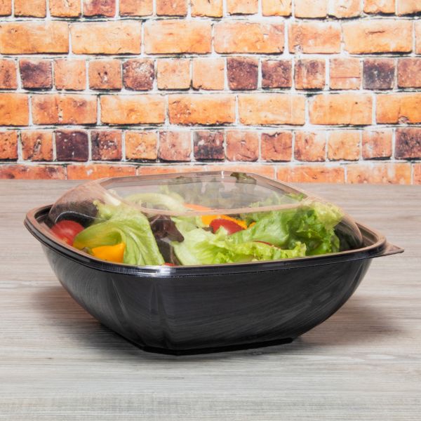 Square dome lid on black salad serving bowl